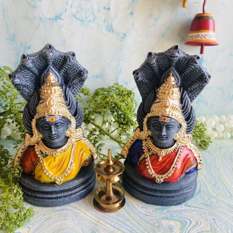 Handcrafted Amman Bust Idol set with a stone finish and vibrant color accents, featuring traditional gold ornaments and cobra hoods for Navaratri Golu.