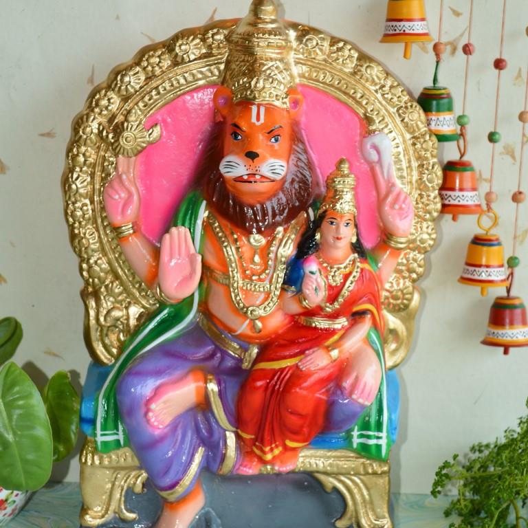 Handcrafted Lakshmi Narasimha Navaratri Golu Doll in vibrant colors with intricate detailing, perfect for festive decor.