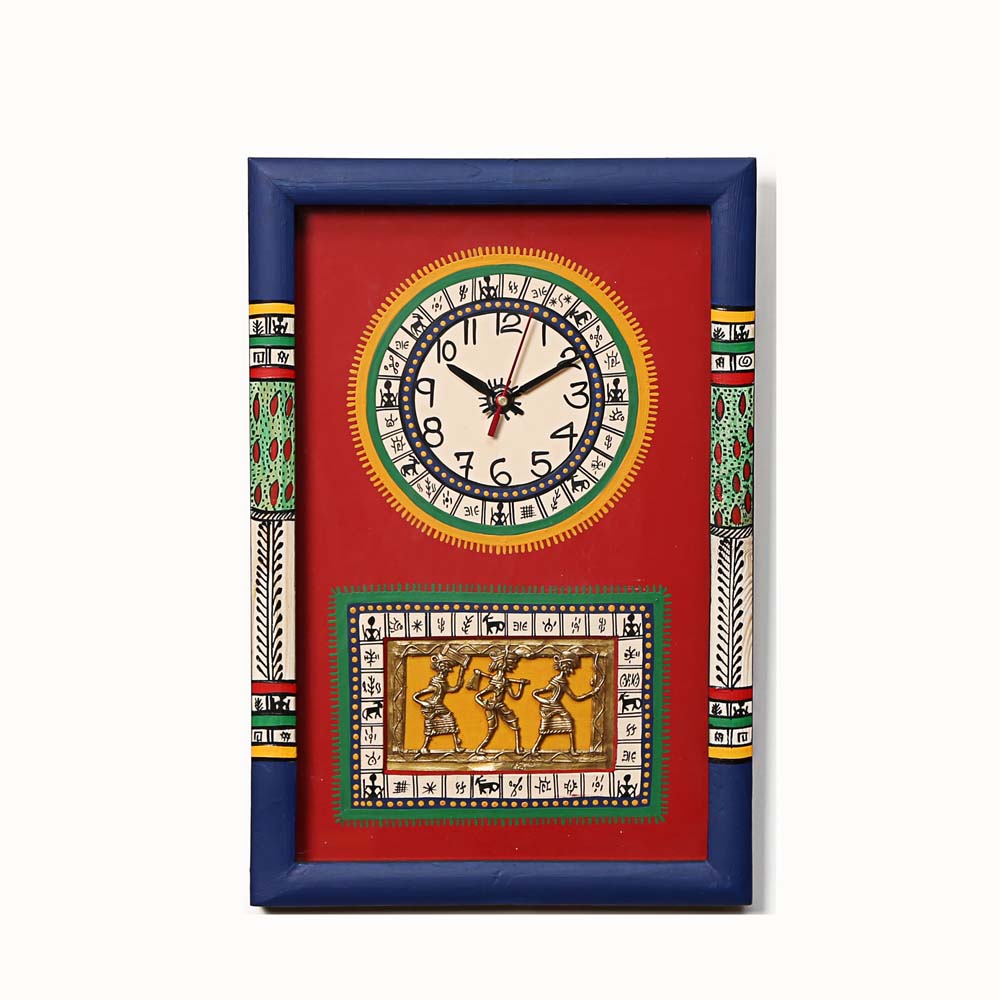 Handcrafted wooden wall clock with a red background, tribal art panel, bold blue frame, and vibrant hand-painted details.