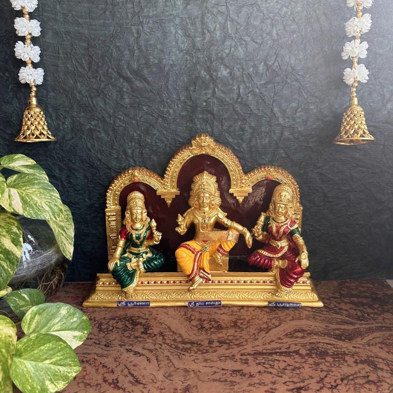 Navarathri Golu Dharma Sastha Trio Dolls with consorts under a golden arch, intricately designed and hand-painted for festive decor.