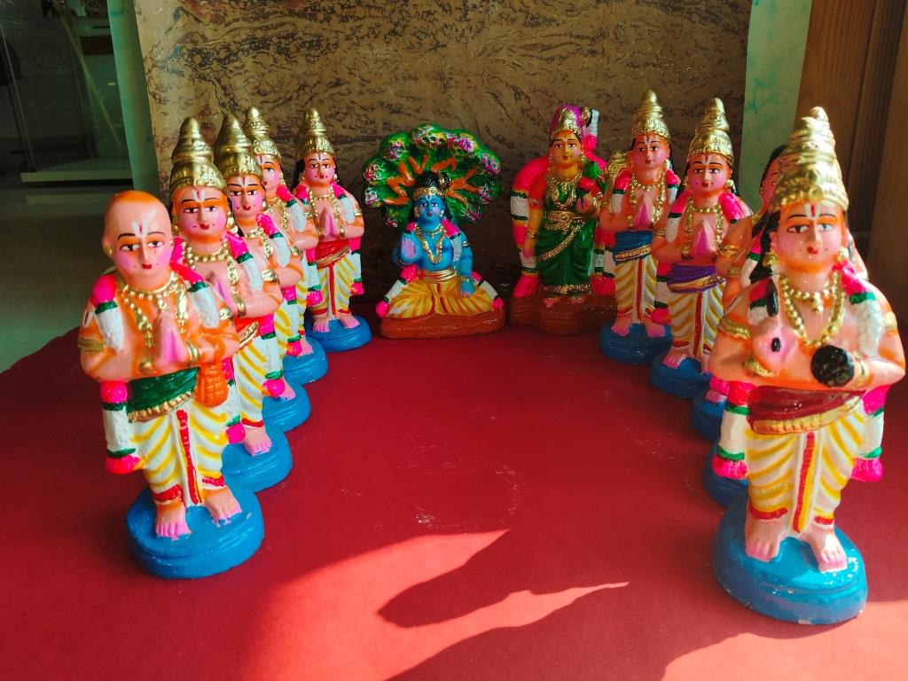 Handcrafted Alwar Saints Navaratri Golu Doll Set featuring the 12 Alwar saints, Lord Vishnu, and Goddess Lakshmi in vibrant colors and intricate detailing.