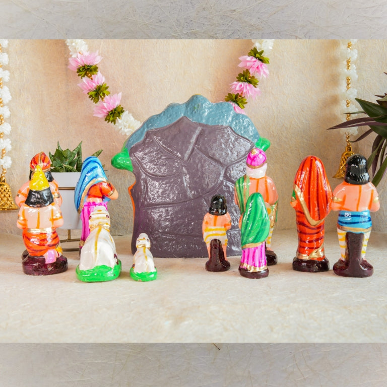 Handcrafted Krishna Govardhana Giri Navaratri Golu Doll Set featuring Lord Krishna lifting the Govardhana Giri, surrounded by devotees and cows in vibrant colors.