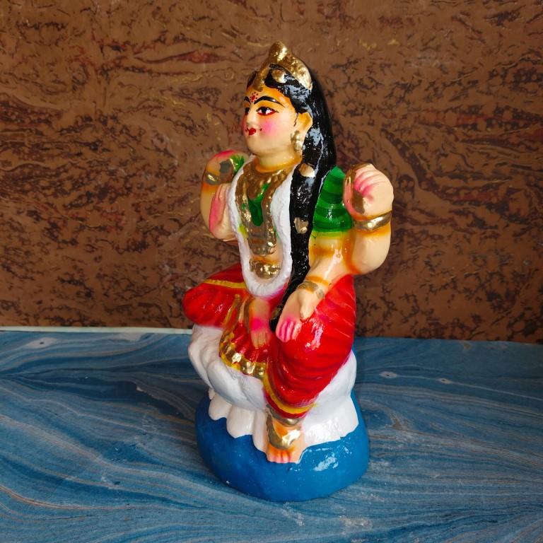Handcrafted Bala Tripura Sundari (Balambigai) Navaratri Golu Doll with vibrant colors, seated on a lotus, symbolizing divine beauty and purity.
