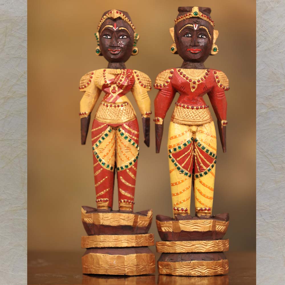 Marapachi Doll Set – Hand-Painted Wooden Couple Figurines in Yellow and Red with Traditional Detailing and Gold Highlights.