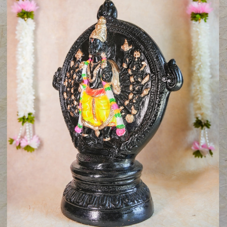 Handcrafted Navarathri Golu doll of Chakrathalwar in a stone finish with intricate detailing and vibrant accents.