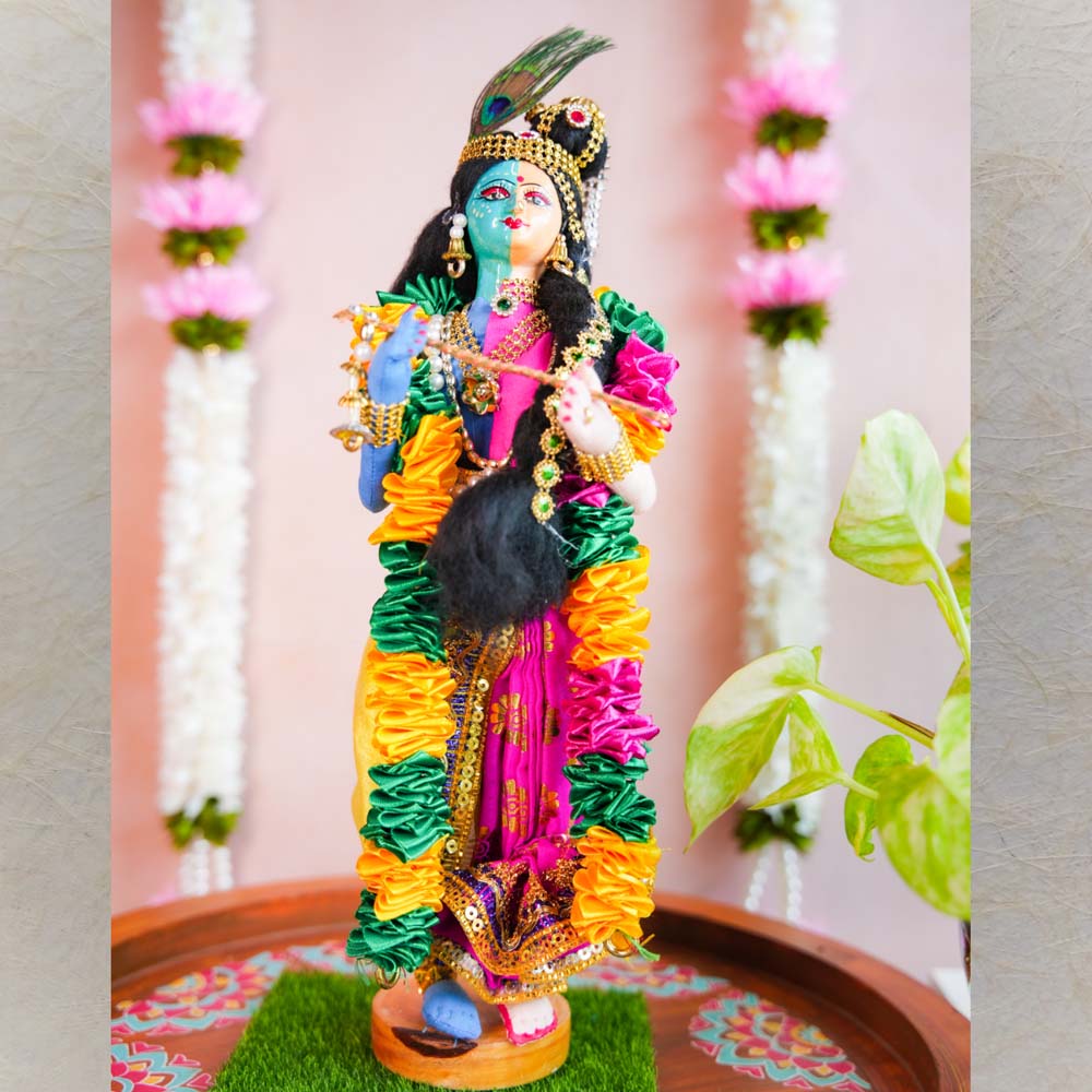 Handcrafted Costume Dolls of Andal and Krishna as Arthanareeswarar in vibrant traditional attire for Navaratri Golu display.