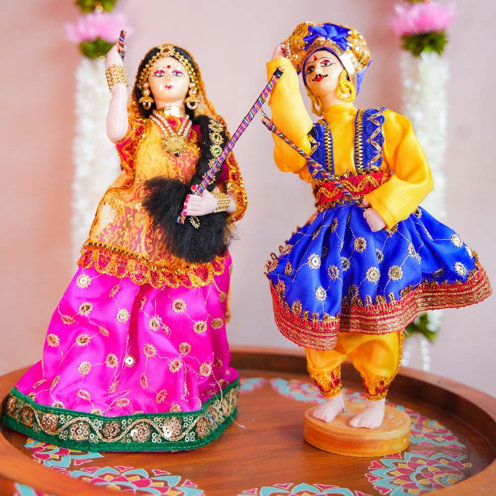 Navaratri Dandiya Couple Dolls in Traditional Costumes – Perfect for Festive Decor and Golu Display.