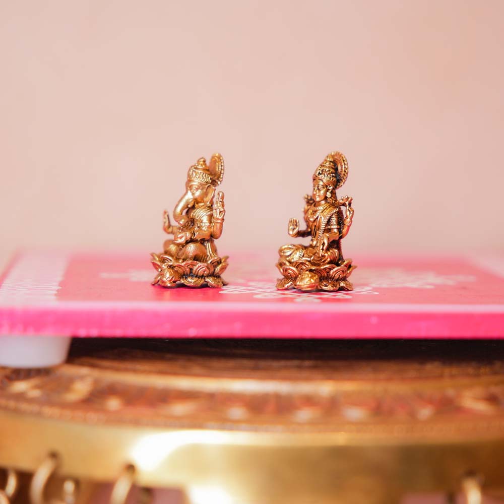 Handcrafted Brass Lakshmi Ganesh Idol Set with intricate detailing, perfect for home temples and festive decor.