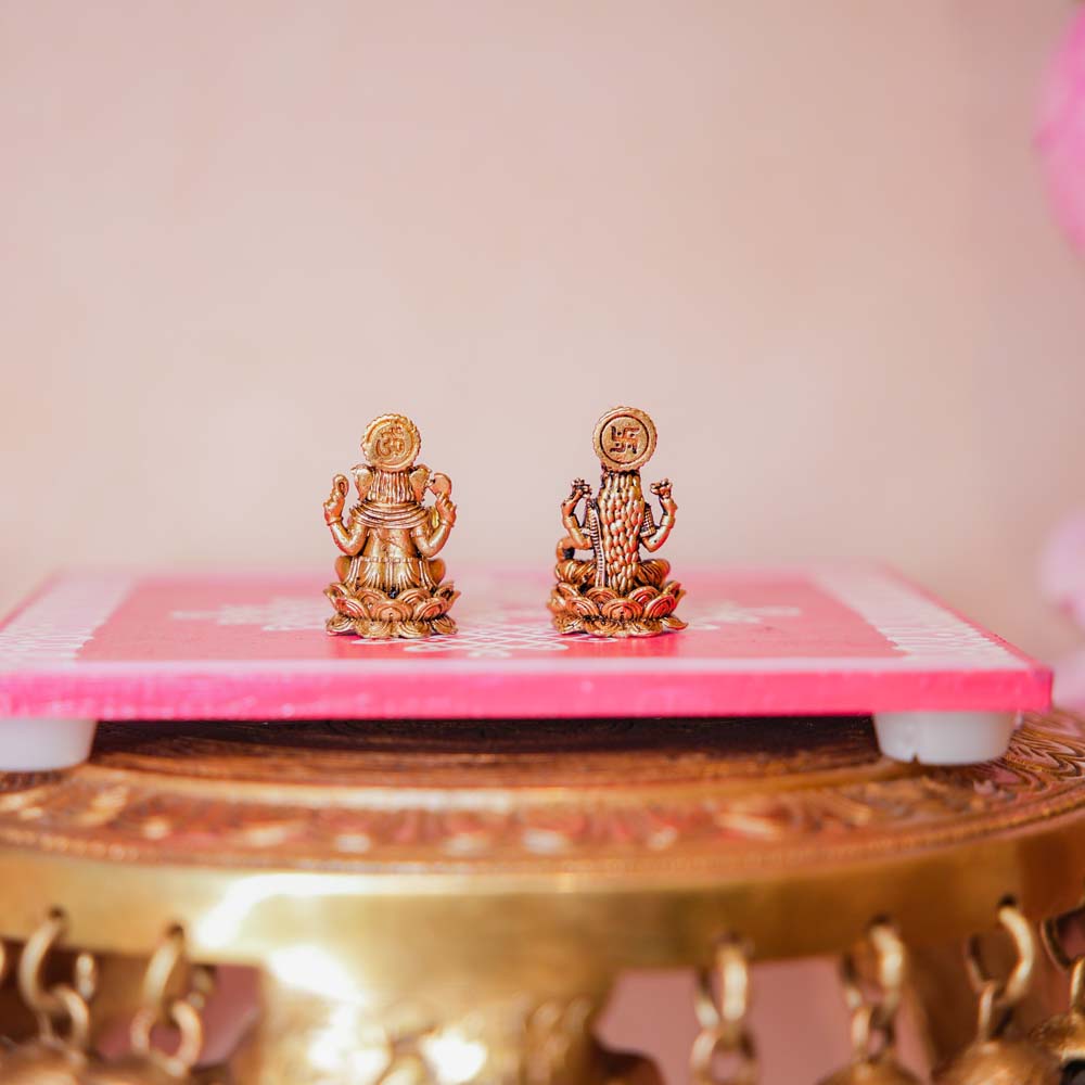 Handcrafted Brass Lakshmi Ganesh Idol Set with intricate detailing, perfect for home temples and festive decor.