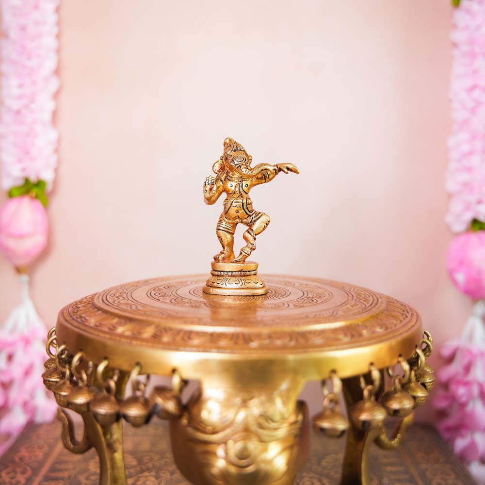 Handcrafted Brass Dancing Ganesha Idol with intricate detailing, ideal for home temples, Navaratri displays, and festive decor.