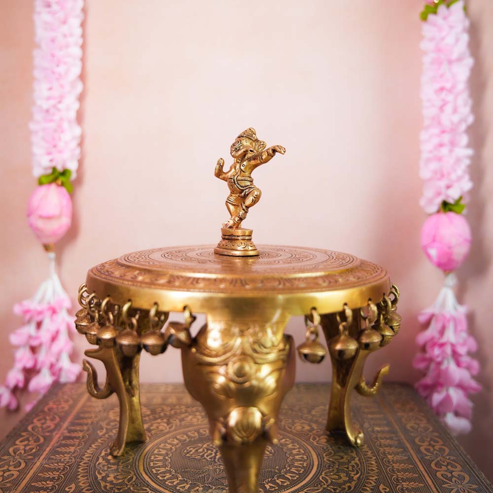 Handcrafted Brass Dancing Ganesha Idol with intricate detailing, ideal for home temples, Navaratri displays, and festive decor.