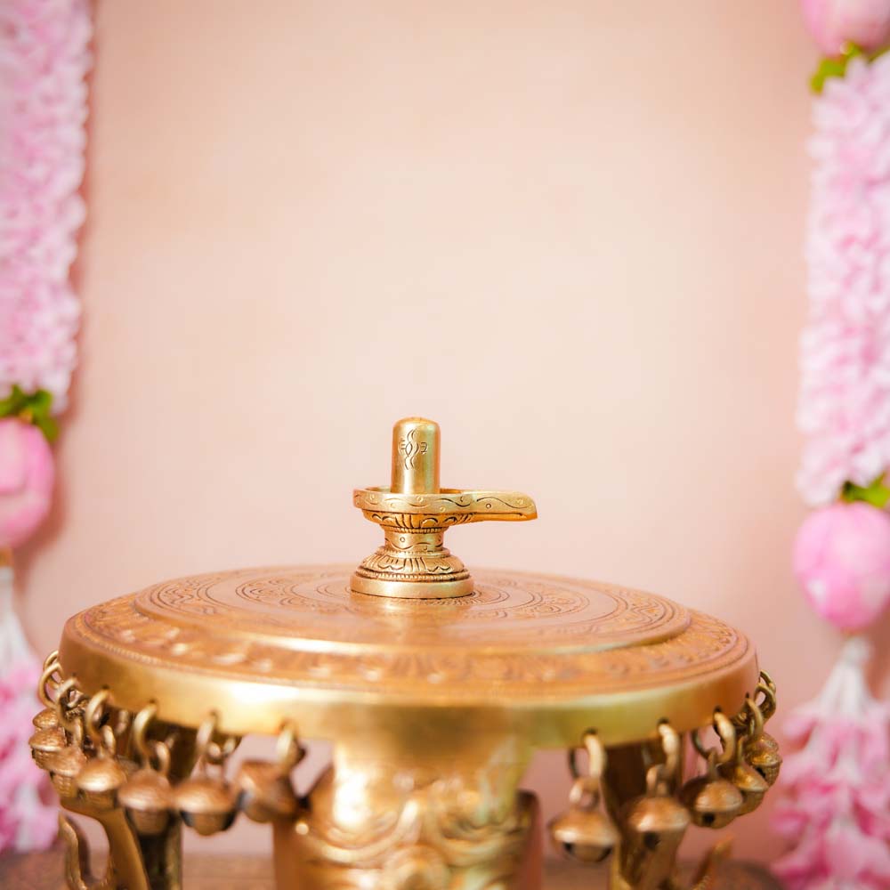 Handcrafted Brass Shivalingam idol with intricate detailing, perfect for home temples or spiritual rituals.