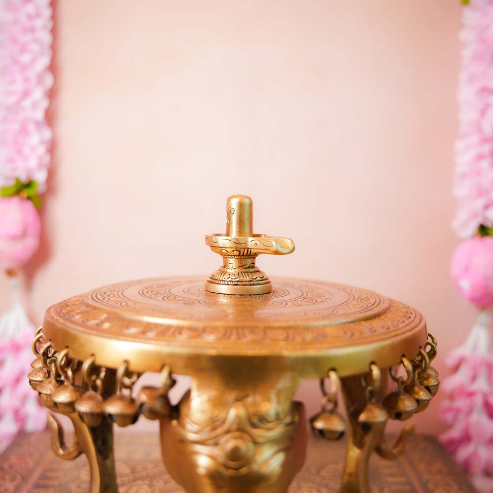 Handcrafted Brass Shivalingam idol with intricate detailing, perfect for home temples or spiritual rituals.