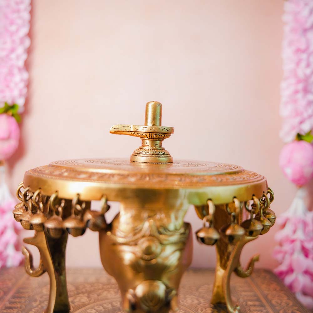 Handcrafted Brass Shivalingam idol with intricate detailing, perfect for home temples or spiritual rituals.