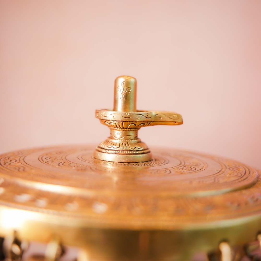 Handcrafted Brass Shivalingam idol with intricate detailing, perfect for home temples or spiritual rituals.