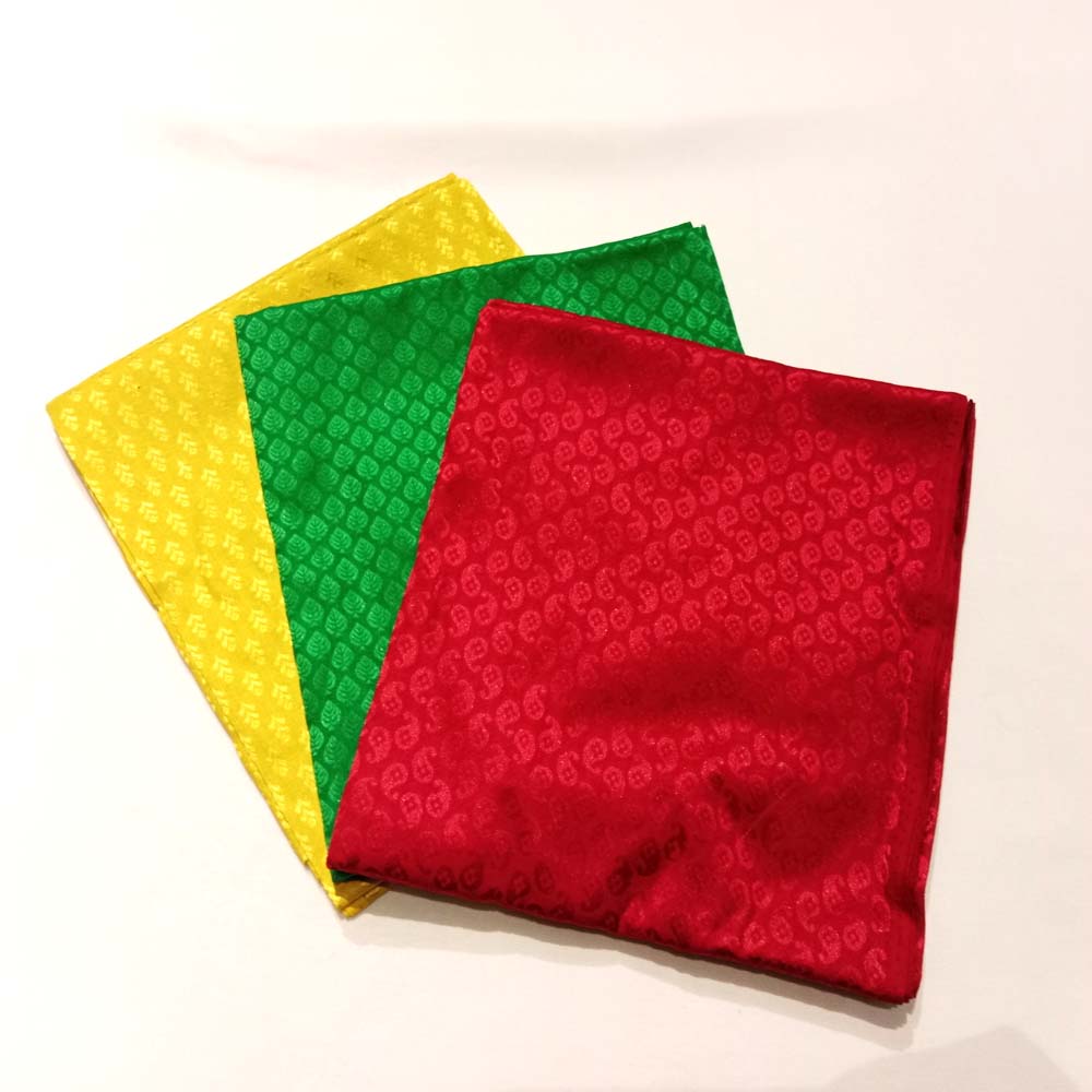 Assorted solid color silk cotton blouse pieces in vibrant shades, ideal for saree pairing and custom tailoring