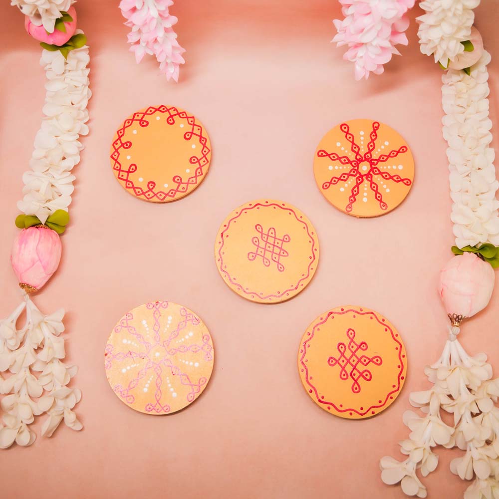 Set of 2 handcrafted Round Kolam Manai in Yellow with white kolam designs, ideal for pooja decor and festive occasions.