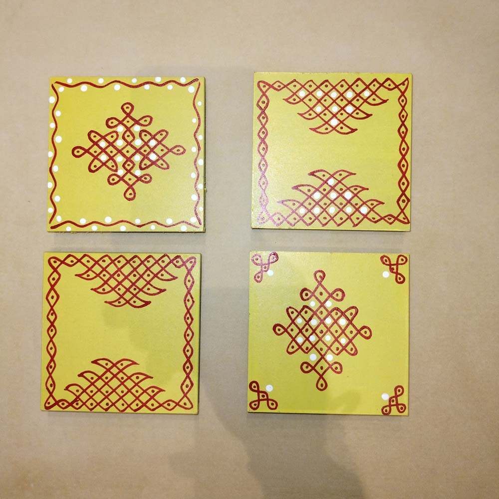 Set of 2 handcrafted Square Kolam Manai in yellow with red kolam patterns, perfect for pooja or festive decor.