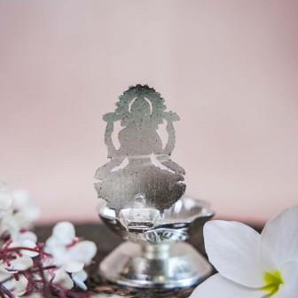Silver Finish Lakshmi Lamp with Intricate Design of Goddess Lakshmi Seated on a Lotus.
