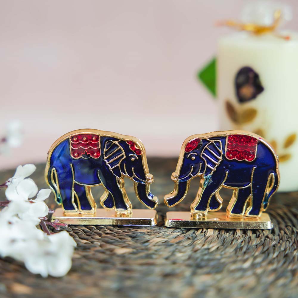 Miniature Elephant Decor Set with Golden Finish and Blue and Red Enamel Detailing.