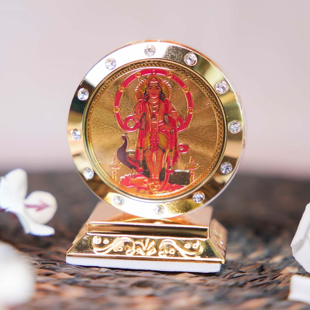 Murugan Car Dashboard Stand with Golden Frame, Embedded Crystals, and Vibrant Depiction of Lord Murugan.