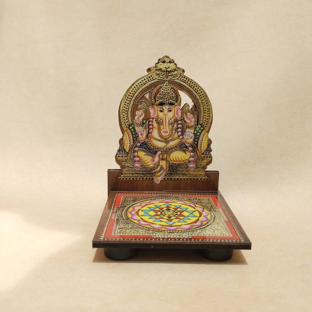 Ganesh Diya Wall Stand with a colorful depiction of Lord Ganesha and a Sri Yantra base, perfect for puja or decorative purposes.