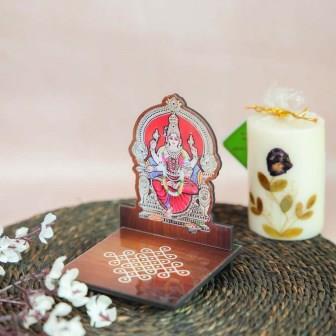 Handcrafted Amman Diya Wall Stand featuring a divine depiction of Amman with a kolam design base, perfect for puja decor.