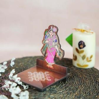 Andal Diya Wall Stand with a colorful depiction of Goddess Andal and a kolam-patterned wooden base for holding oil lamps.
