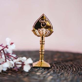 Murugar Vel in a gold finish, a beautifully crafted spiritual decor piece for puja rooms.