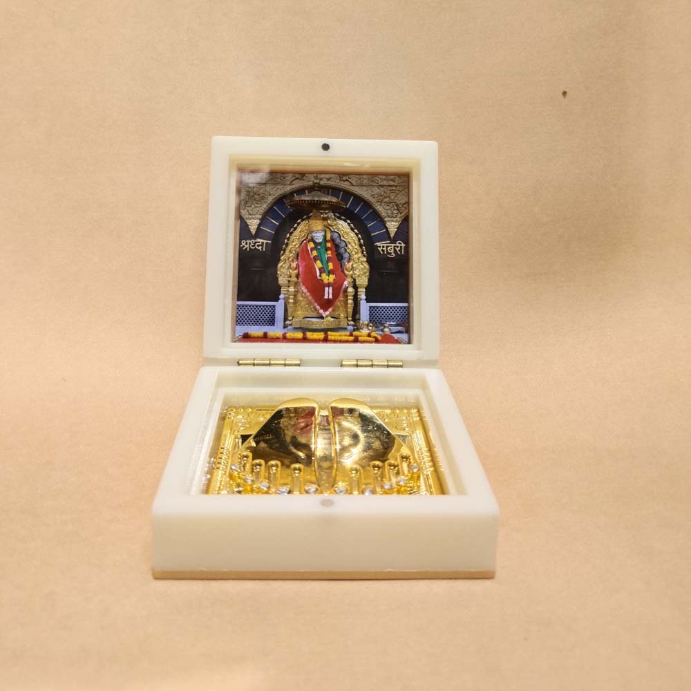 Sai Baba Paduka in a Decorative Box with Golden Base and Image of Sai Baba in His Shrine.