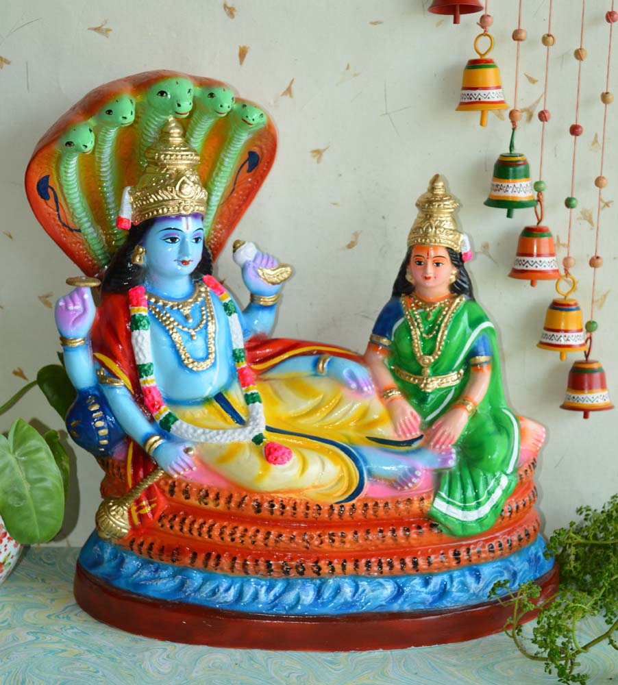 Handcrafted Navarathri Golu doll of Lord Ranganathar reclining with Goddess Lakshmi, adorned with Adisesha.
