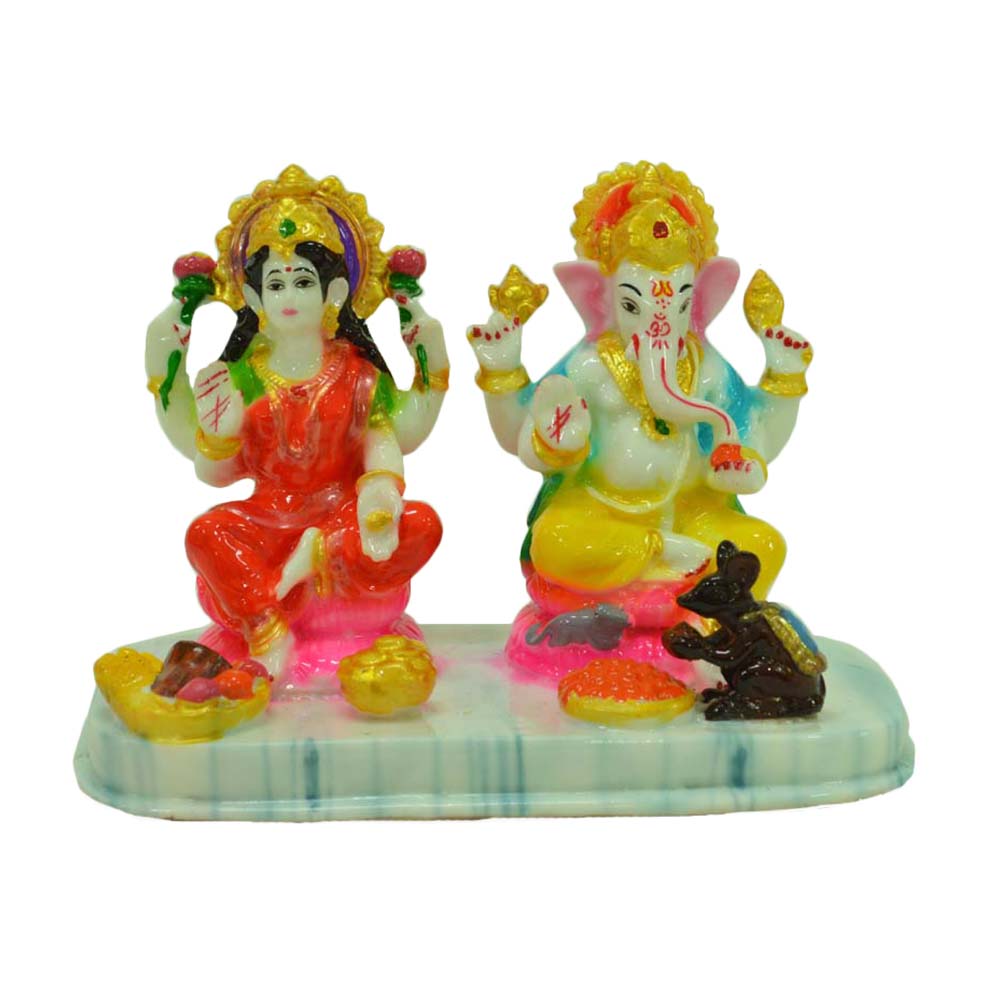 Colorful Lakshmi Ganesh idol set seated on a decorative peedam, ideal for pooja and festive decor.