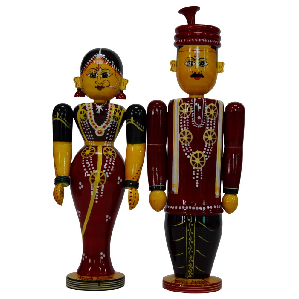 Handcrafted Navarathri Golu Marriage Couple Set featuring a traditionally dressed bride and groom in vibrant colors.