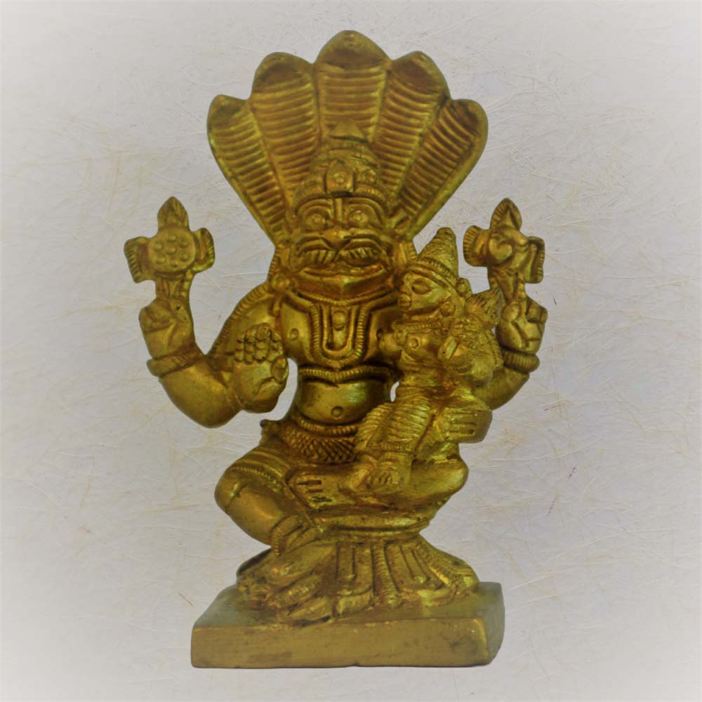 Eternal Lakshmi Narasimhar brass idol featuring Lord Narasimha with Goddess Lakshmi seated on his lap, intricately crafted for pooja and decor.