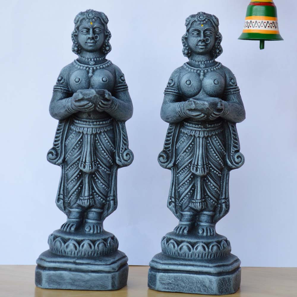 Handcrafted Navaratri Paavai Vilakku Jodi Golu dolls, intricately designed with a stone-like finish, depicting women holding lamps.