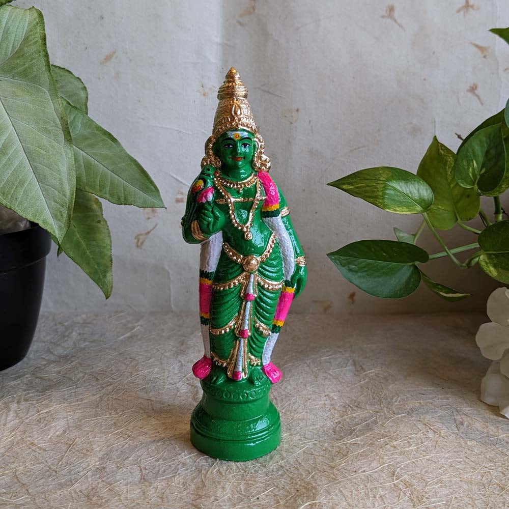 Hand-painted small green Meenakshi Golu doll holding a parrot, perfect for Navarathri decoration.