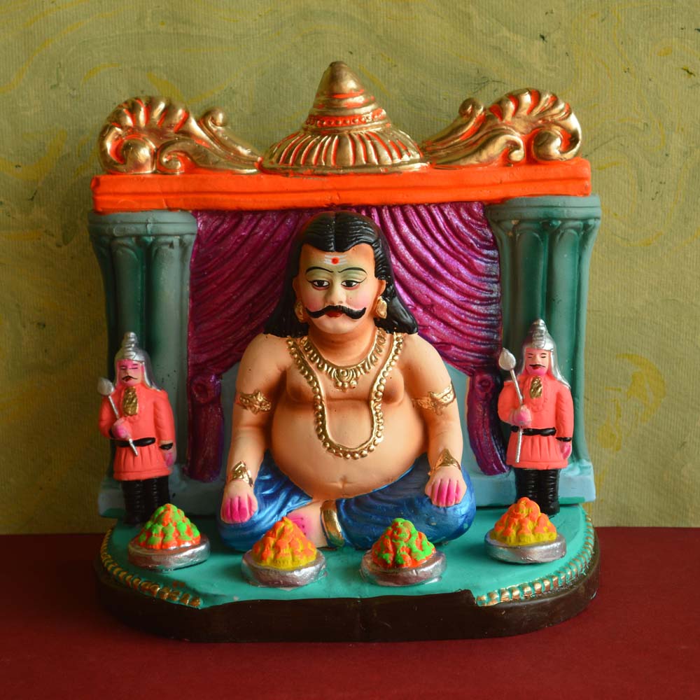 Golu Dolls - Kumbakarna Bhojan from Maya Bazaar depicting Kumbakarna seated amidst food with guards, hand-painted and vibrant.