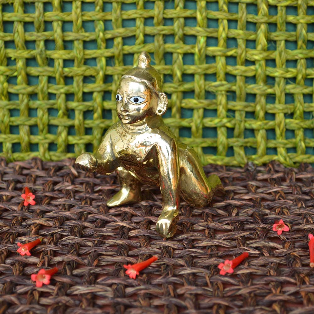 5-inch Eternal Bala Krishna brass idol depicting baby Krishna in a crawling pose, perfect for pooja and home decor.