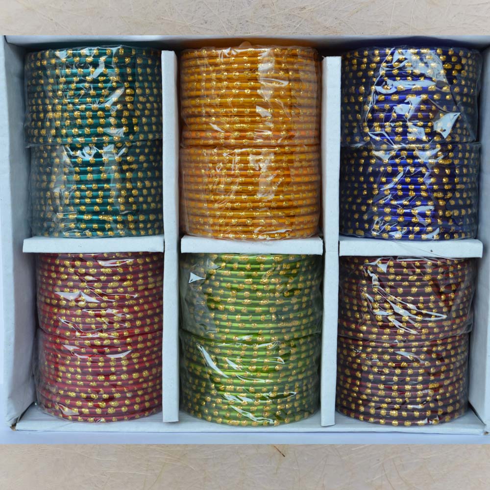 Box of colorful glass bangles with large gold single dots, size 2.6, ideal for festive and wedding wear.