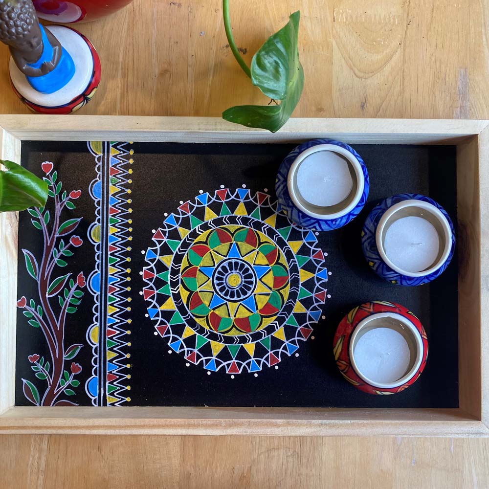 Black Pattachitra wooden tray with vibrant mandala and floral hand-painted designs, ideal for serving or home decoration.