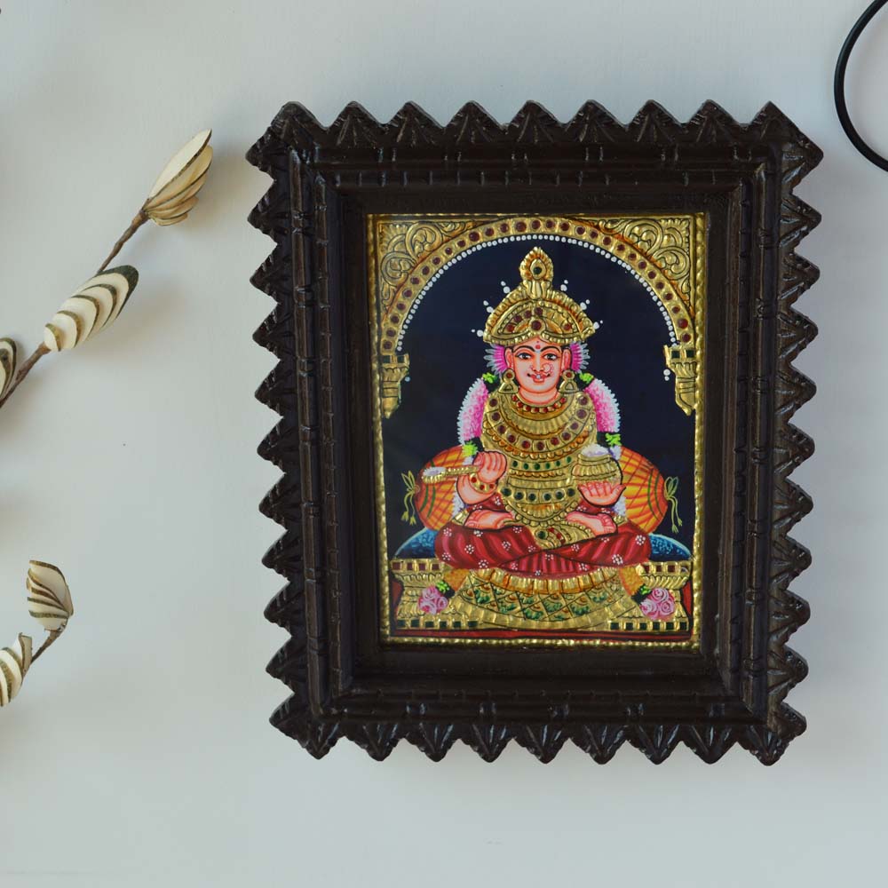 Tanjore Painting of Goddess Annapoorni with Gold Foil Embellishments in a Carved Wooden Frame