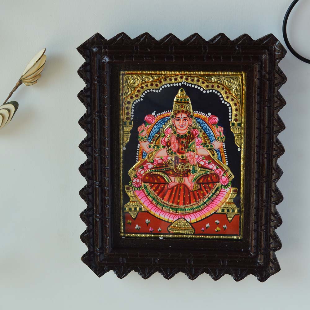 Tanjore Painting of Goddess Aishwarya Lakshmi with Gold Foil Embellishments in a Wooden Carved Frame