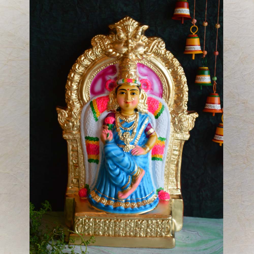 Handcrafted Navarathri Golu Doll depicting Goddess Kamalambigai seated on a golden throne, painted in vibrant colors with delicate detailing.