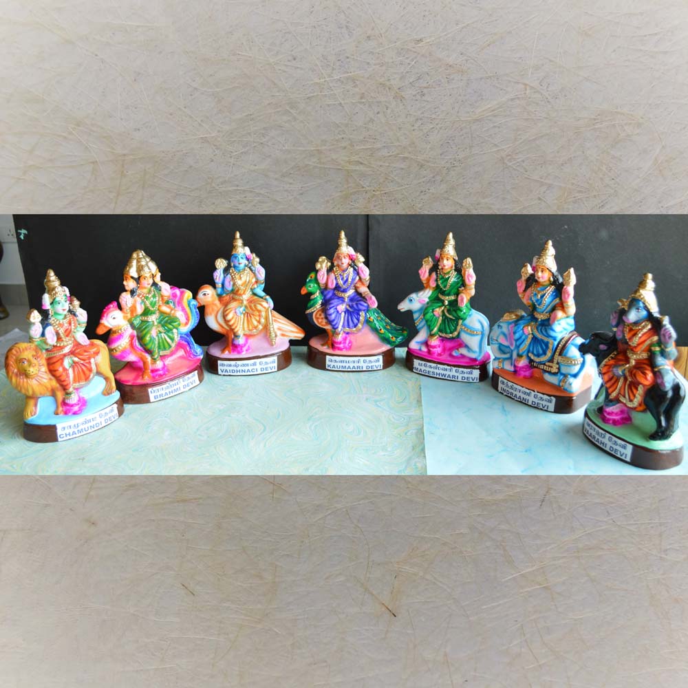 Hand-painted Navarathri Golu Dolls set featuring Seven Devis in vibrant traditional attire, seated on their respective vahanas.