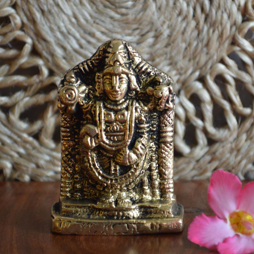 Handcrafted brass idol of Lord Balaji with intricate details, perfect for pooja and home décor.