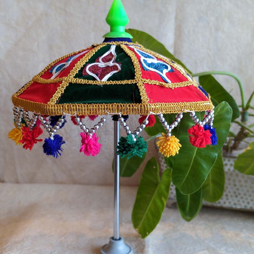 Traditional decorative umbrella with multicolor embroidery, mirror work, and tassels, perfect for festive and ceremonial use.