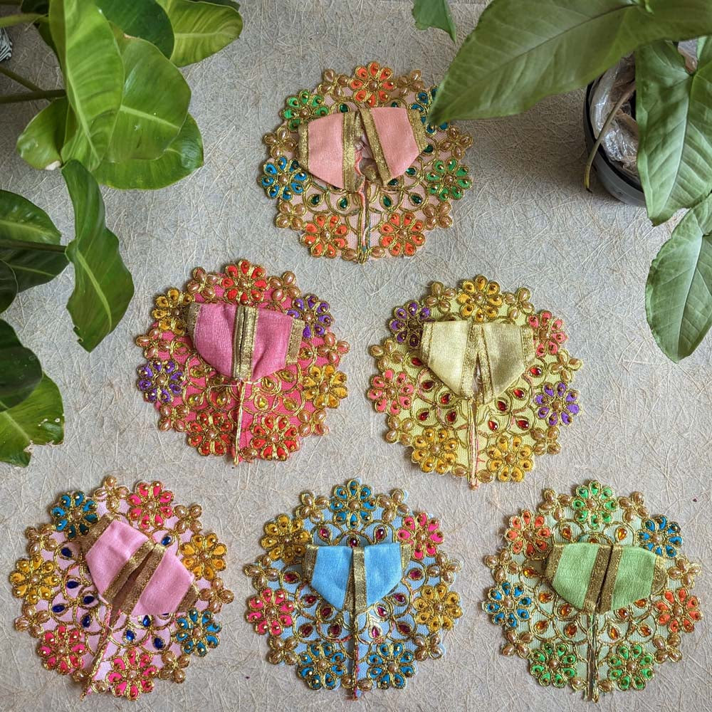 Set of six 6 Floral Lalji Vastras with intricate embroidery, multicolor embellishments, and golden accents for deity decoration.