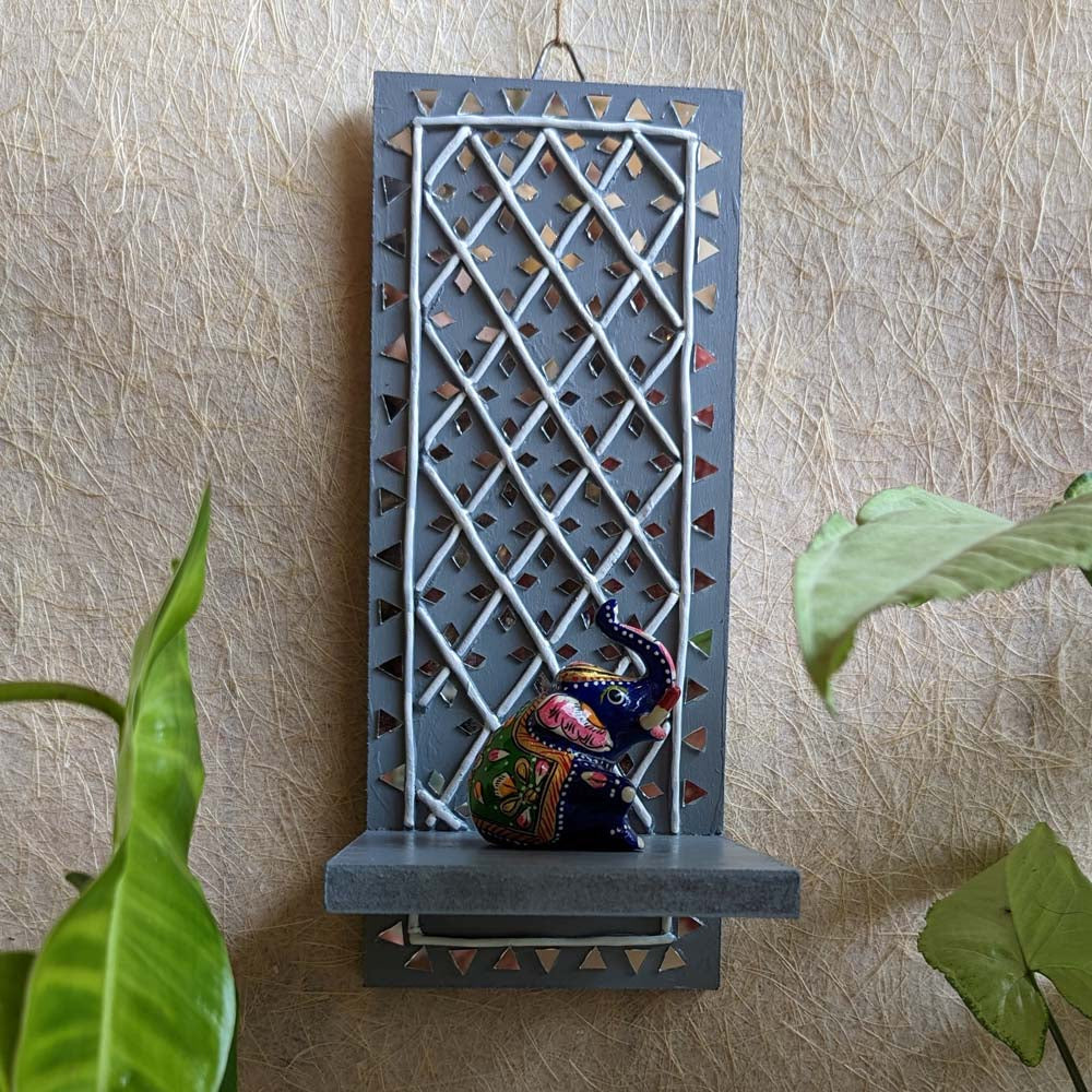 Handcrafted Lippan Art Wall Shelf with intricate mirror work and lattice design.