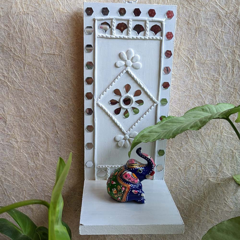 Handcrafted Lippan Art Wall Shelf with intricate mirror work and lattice design.