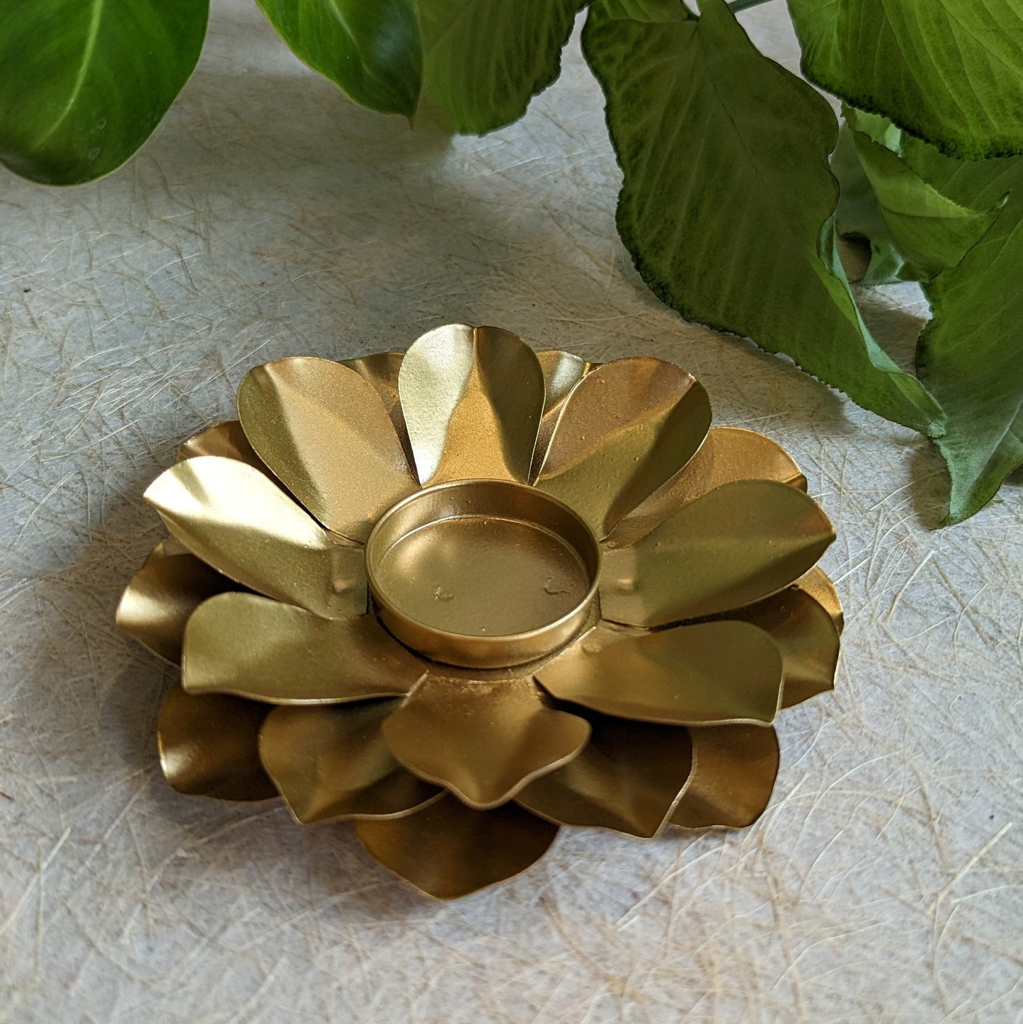 Brass Folded Flower Diya with elegant petal design, perfect for pooja rituals and festive decor.